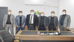 Besni’de siyasi partilerin ilçe başkanları buluştu