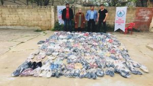 DGSKON'dan bin 500 aileye giyim yardımı