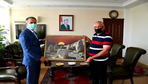 Güneşin fotoğrafçısından Vali Çuhadar'a ziyaret