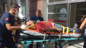 Tırdan yük indirirken aşağı düşen işçi yaralandı